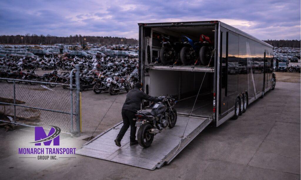 Monarch - Buying a Motorcycle at Auction or Out of State_ Here's How to Get It Home 5 Motorcycle being collected from salvage auction facility by transport carrier.