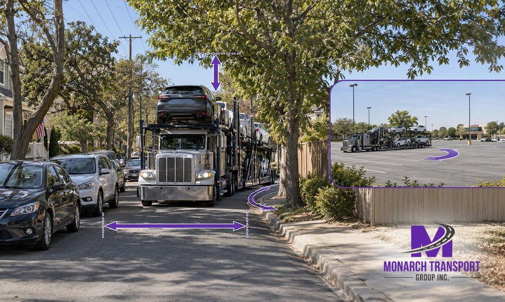 Monarch - Car Shipping Near Me- How Local Pickup Works With Nationwide Carriers 5 Open car carrier on a narrow American residential street with limited turning space, overhanging trees, and parked cars, with an accessible parking lot nearby for safe vehicle pickup.